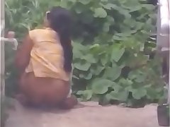 Sexy babe pissing in public